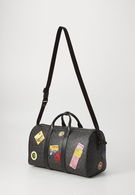 C0ACH                                 GOTHAM DUFFLE BAG 45 IN SIGNATURE CANVAS WITH PATCHES