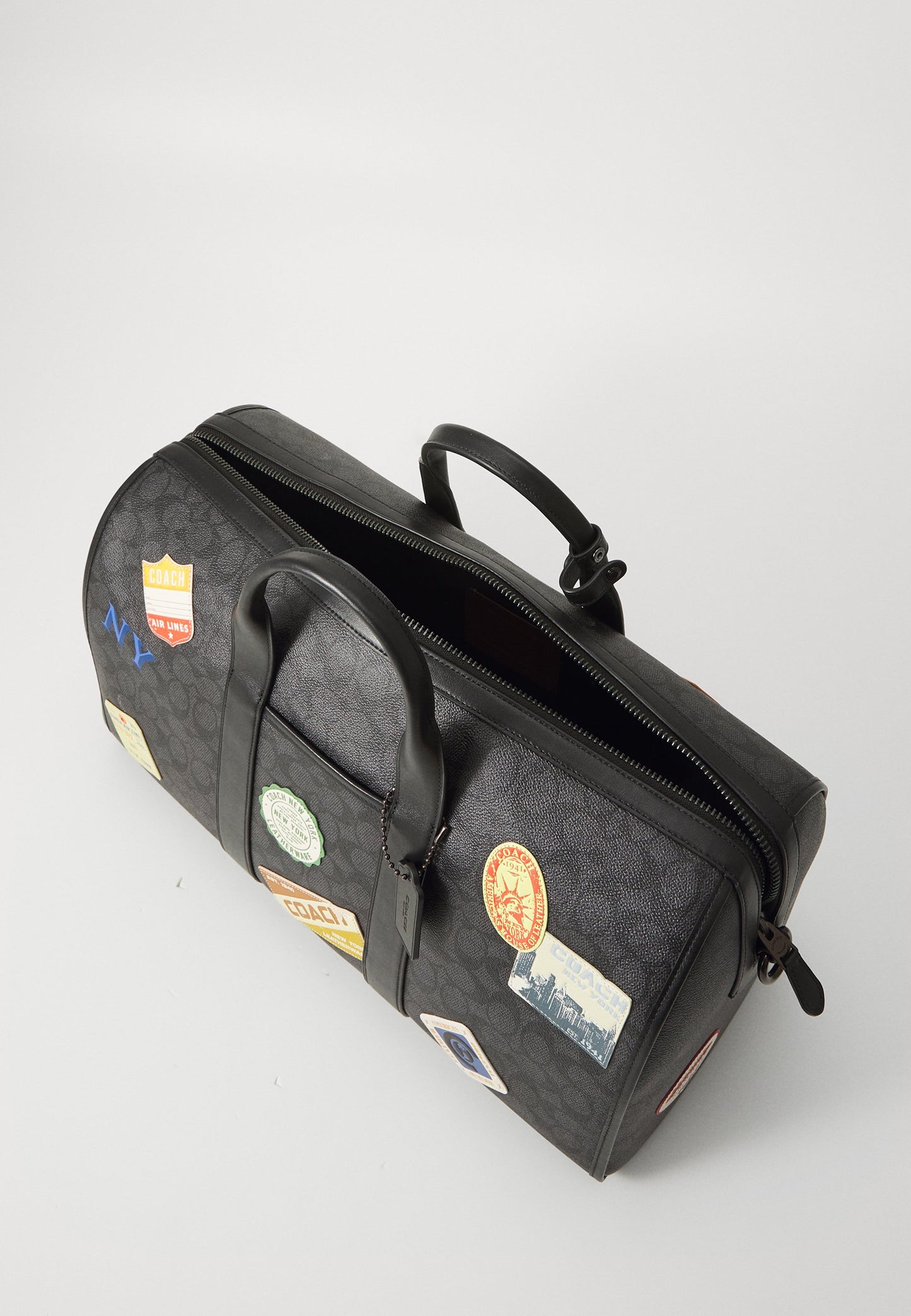 C0ACH                                 GOTHAM DUFFLE BAG 45 IN SIGNATURE CANVAS WITH PATCHES
