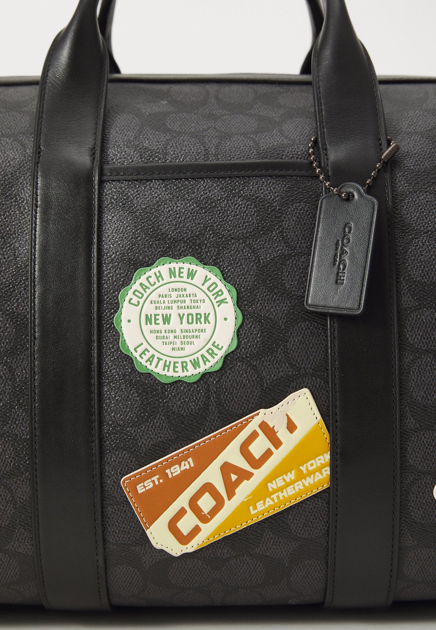 C0ACH                                 GOTHAM DUFFLE BAG 45 IN SIGNATURE CANVAS WITH PATCHES
